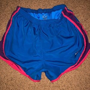 BLUE NIKE SHORTS with pink and purple Stripe